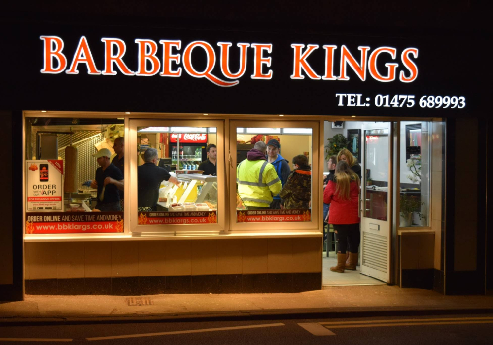 sizzling kebabs over fire served at Barbeque Kings Largs